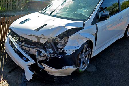 Burchell Assessors inspecting damage to car after crash